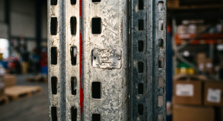 Close-up of a galvanized racking upright showing steel quality and coating